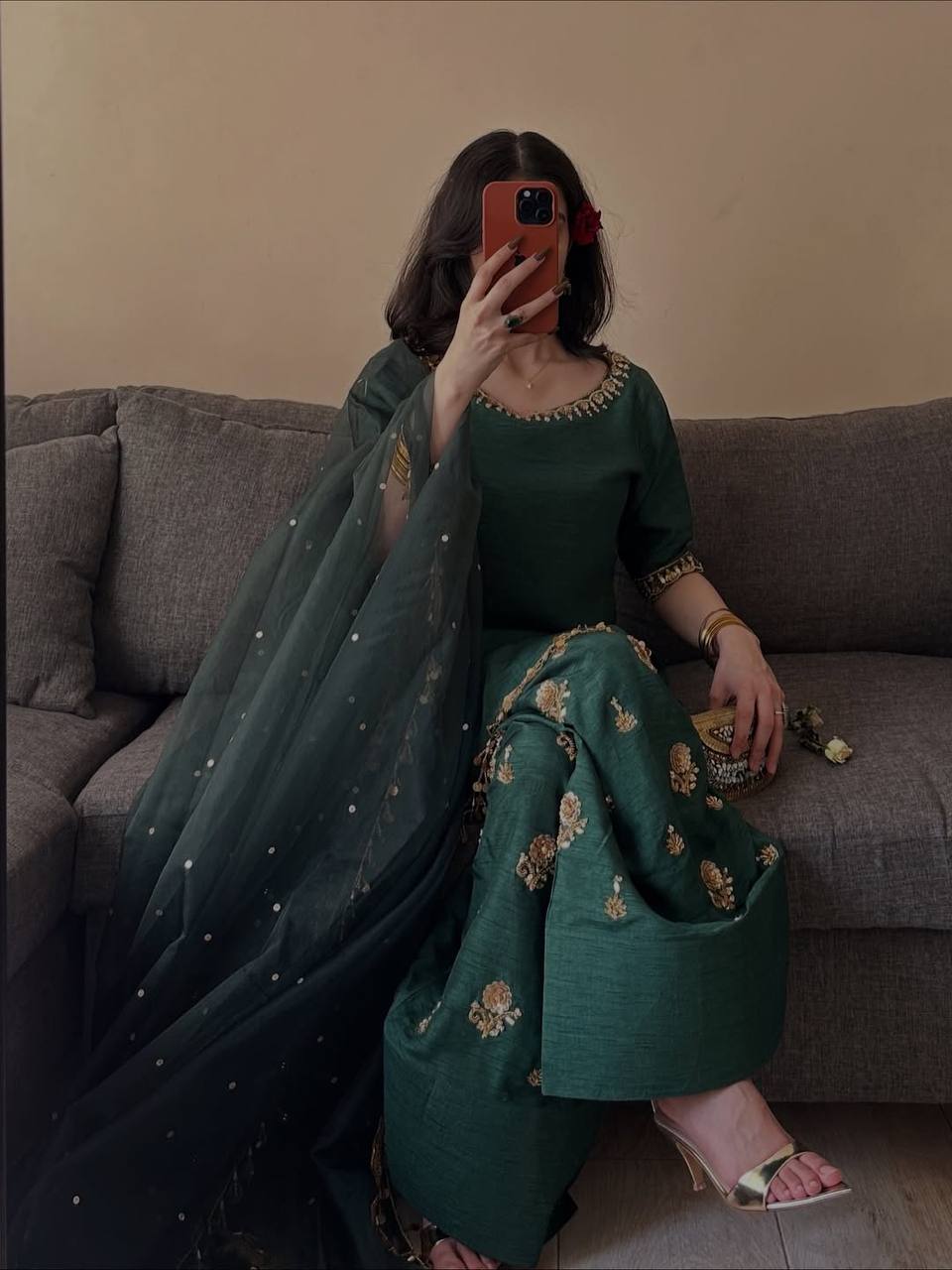 Majestic Emerald Green Kurta and Salwar Suit Set Featuring Intricate Gold Embroidery, Floral Motifs, and Ornate Coin Tassel Embellishments
